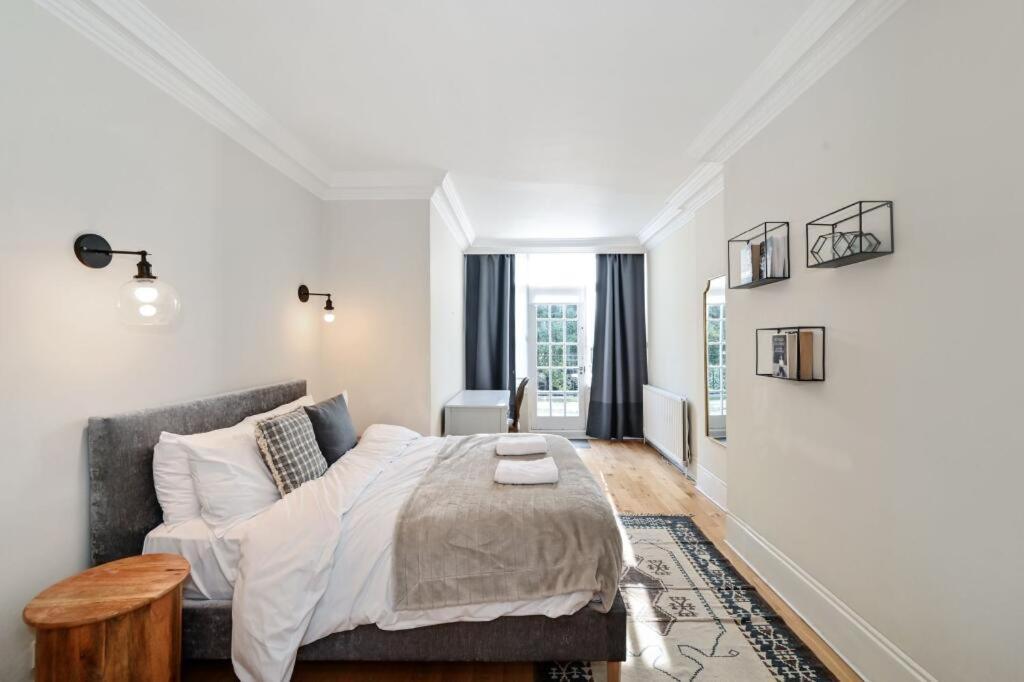 Elegant 6 Bed With Garden & Balcony By Harrods Hébergement de vacances *